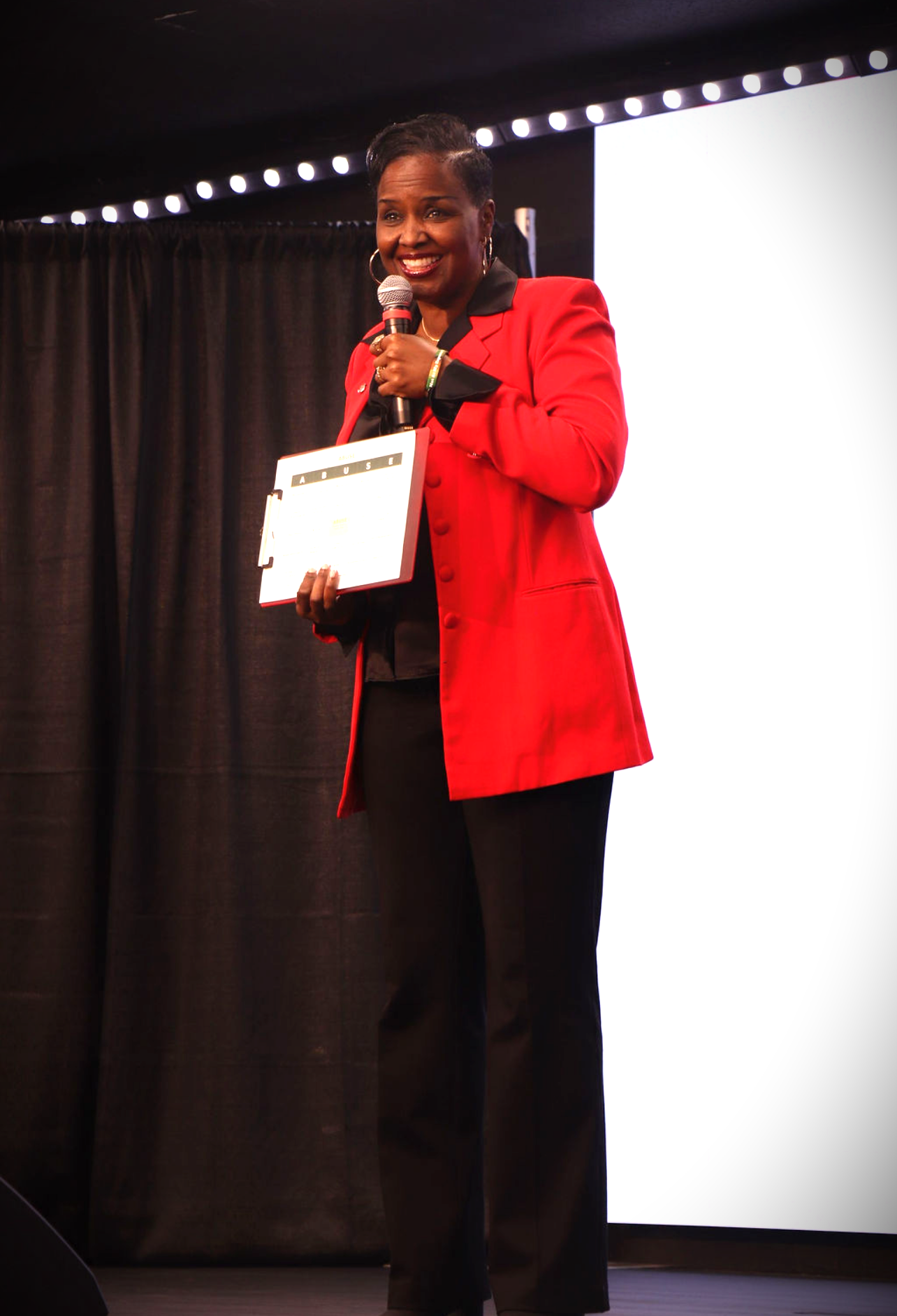 Dr. DeAnna delivering Keep The Light On keynote